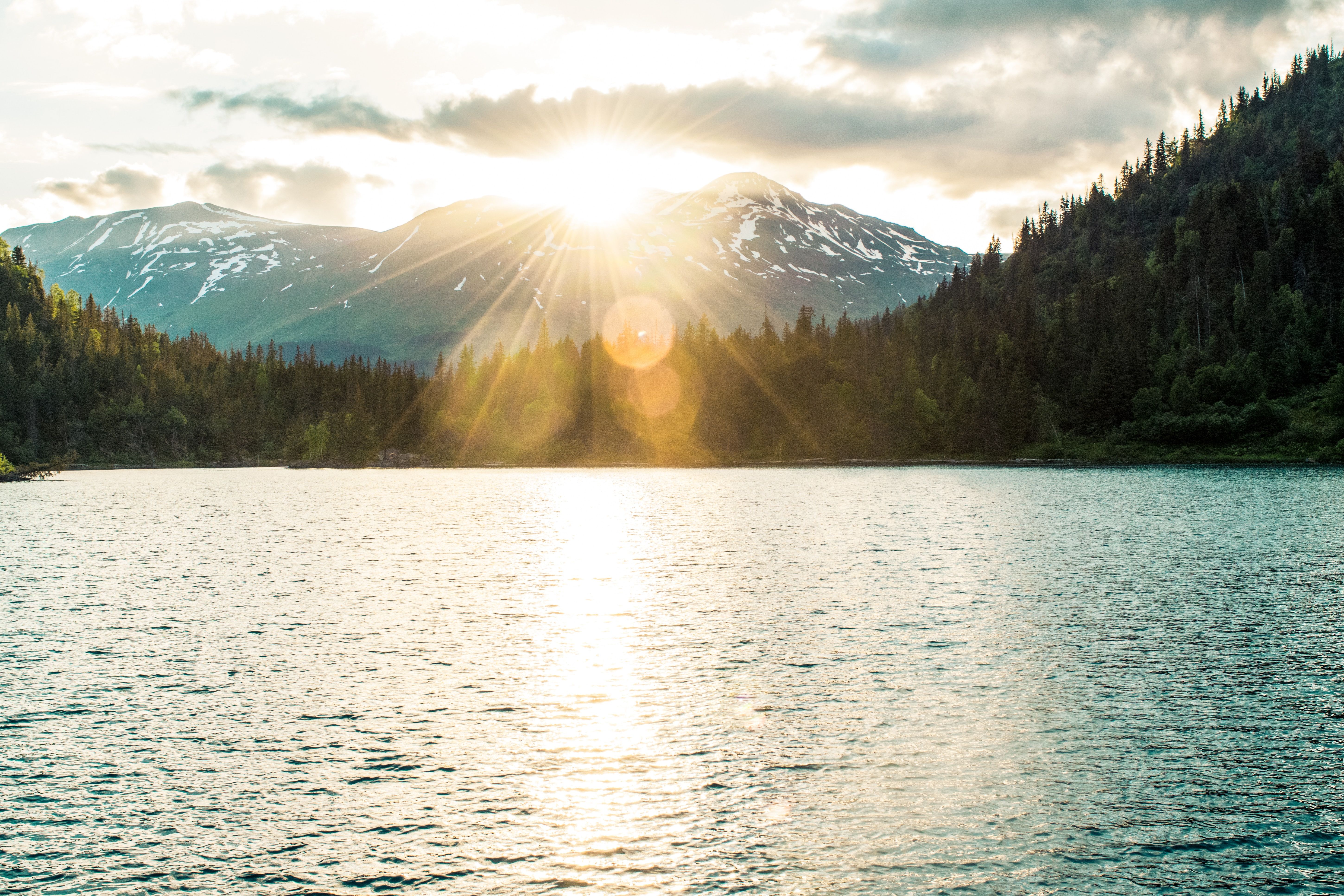Sunrise over mountains and ocean